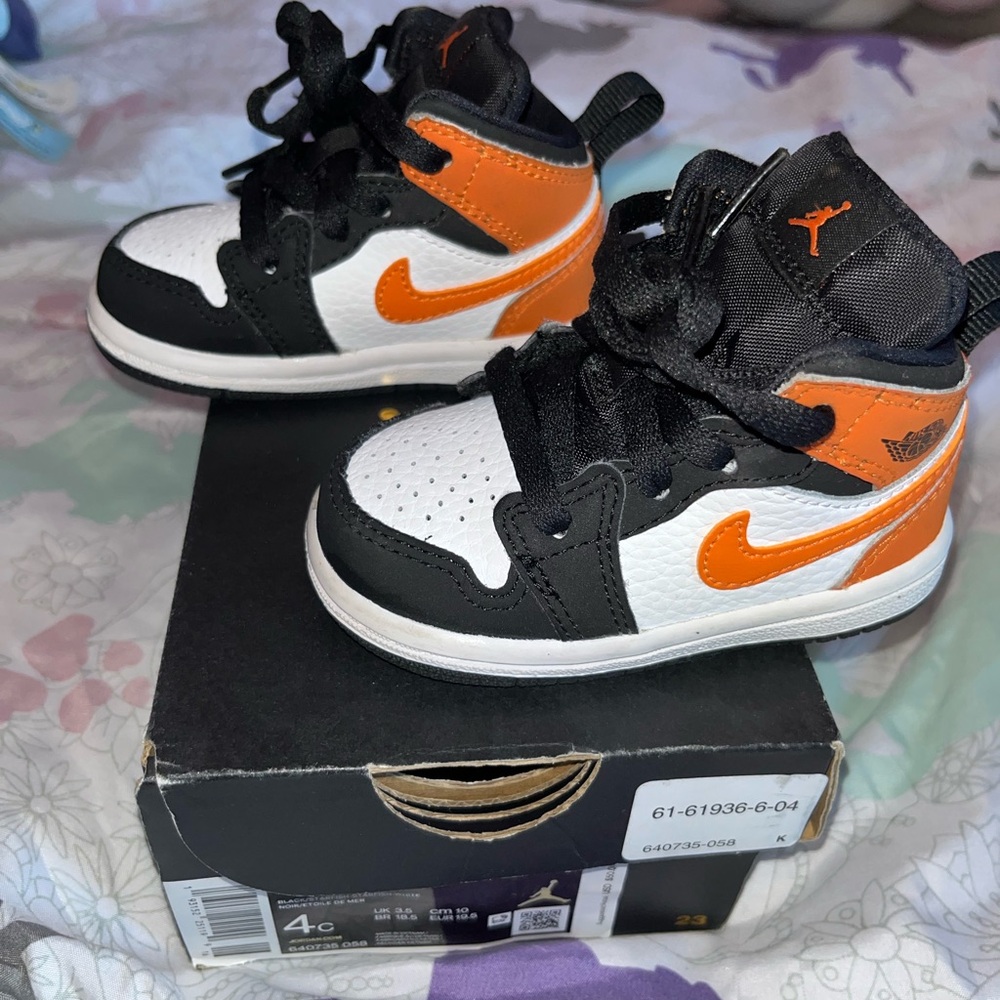 Jordan Kids' Black, White, and Orange Sneakers